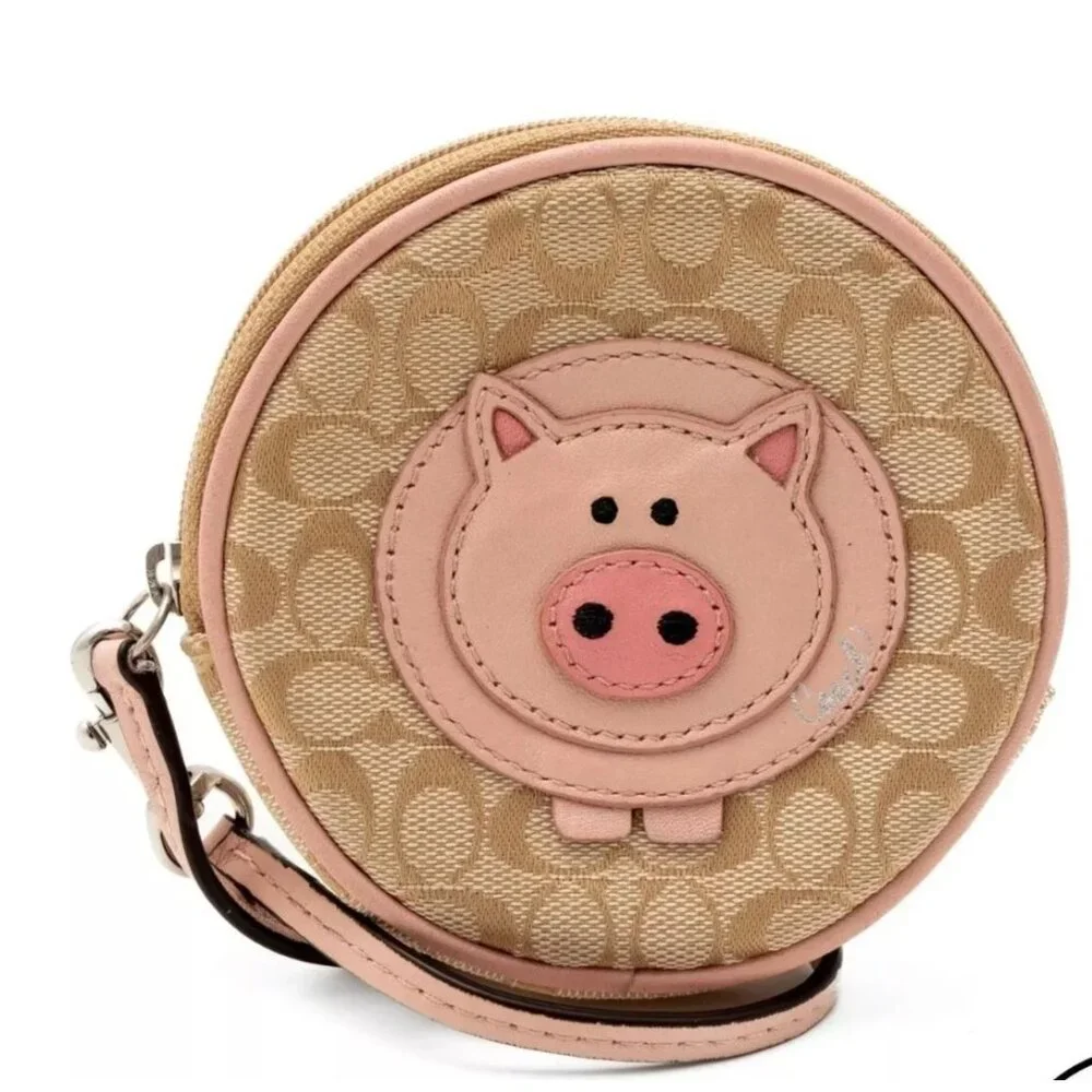 SOLD Coach Limited Edition Pig Embossed Signature Jacquard Canvas Coin Wristlet - Picture 1 of 3